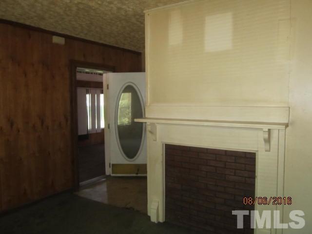 2543 Leasburg Road Roxboro, NC 27574 - Photo 11 of 18 a close view of light fixtures and a mirror