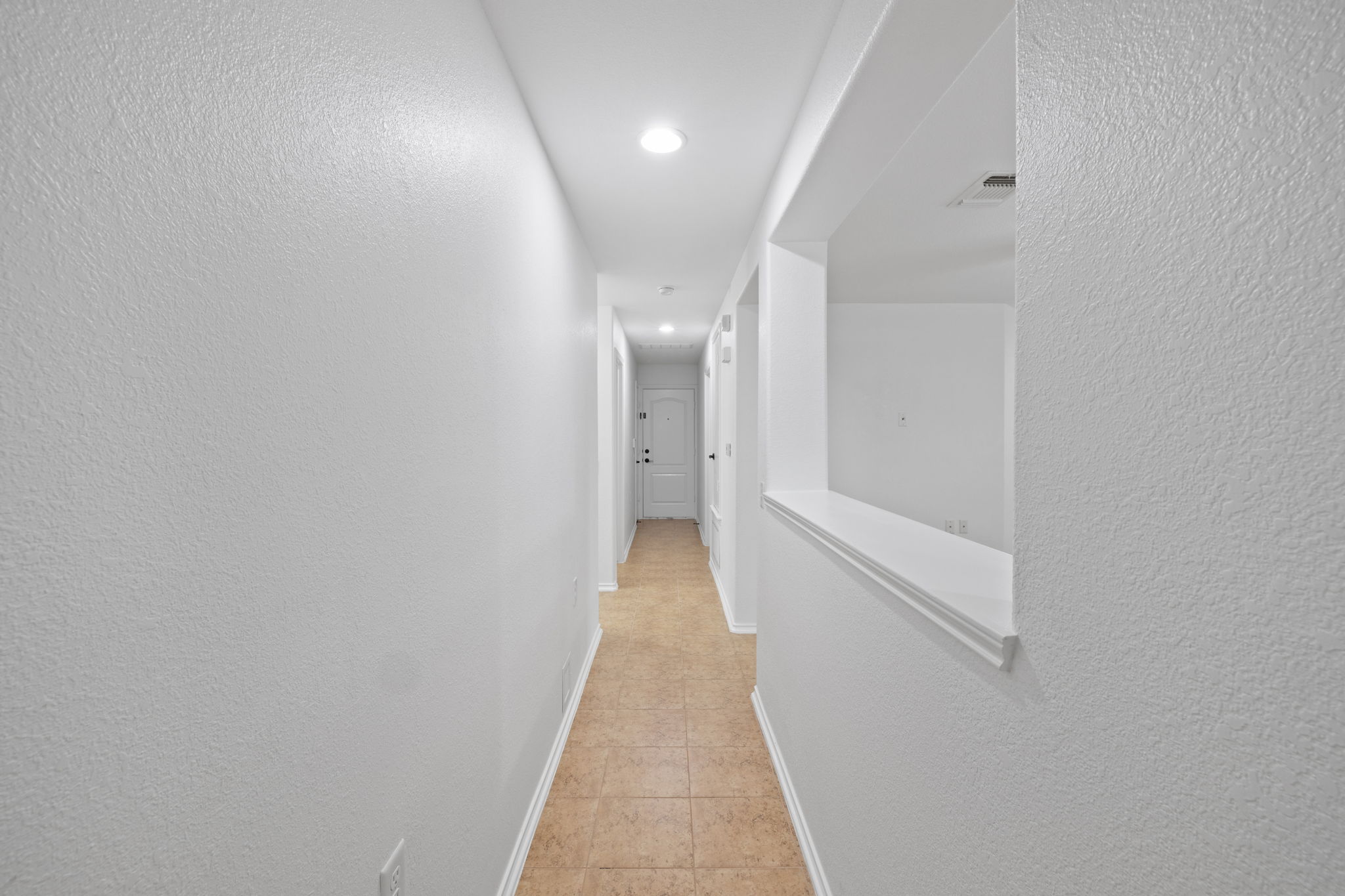 8825 Stambourne Street Austin, TX 78747 - Photo 13 of 37 a view of a hallway