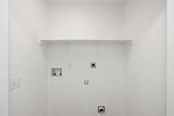 a bathroom with 2 sink and a toilet