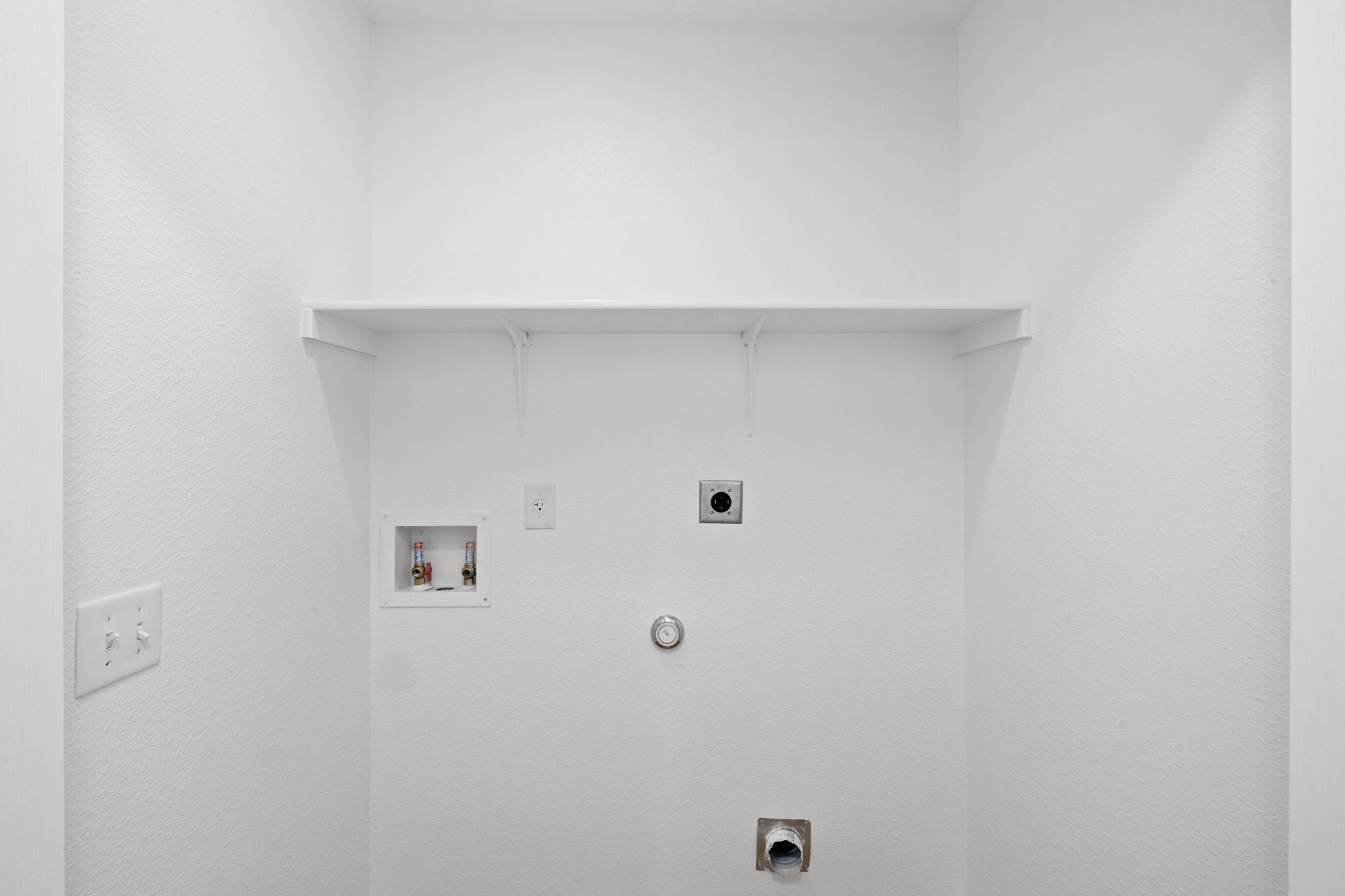 8825 Stambourne Street Austin, TX 78747 - Photo 14 of 37 a view of a utility room