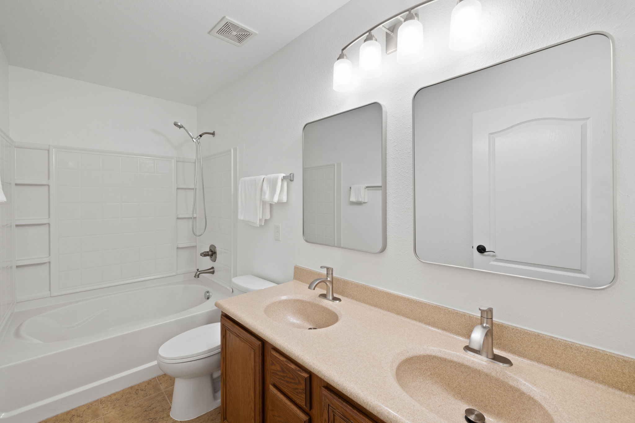 8825 Stambourne Street Austin, TX 78747 - Photo 26 of 37 a bathroom with a sink and a tub
