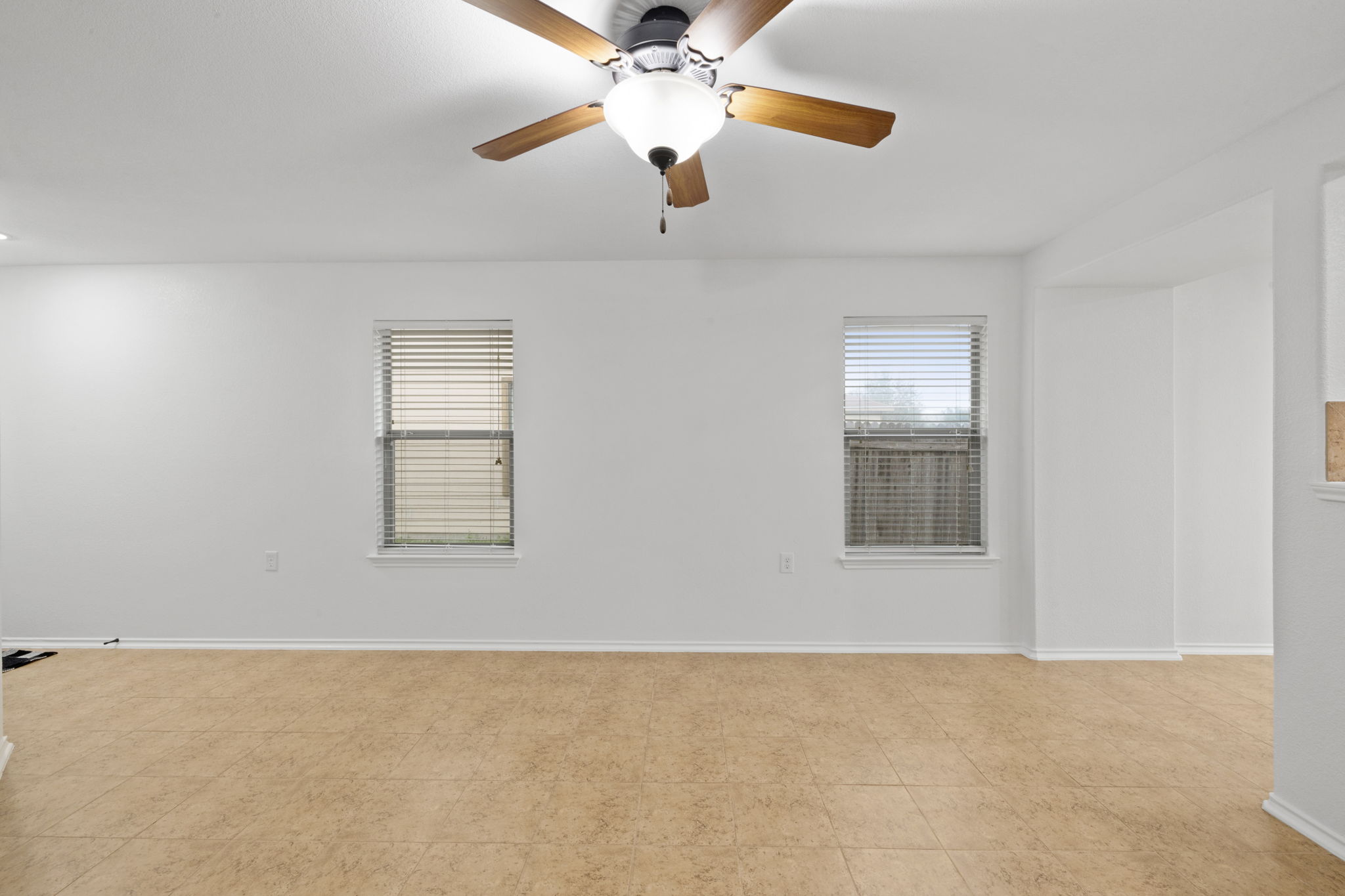 8825 Stambourne Street Austin, TX 78747 - Photo 28 of 37 a view of an empty room with a window