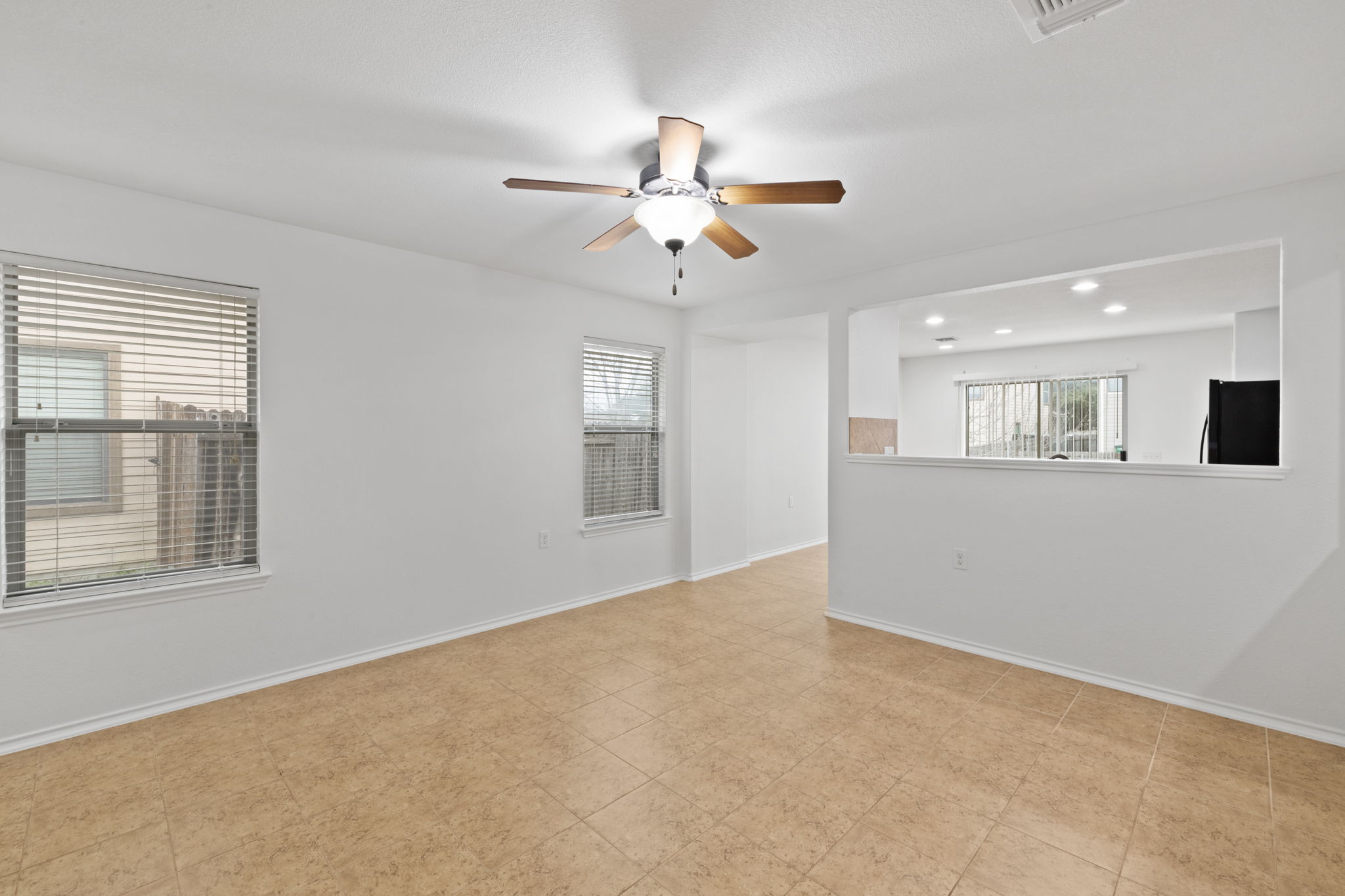 8825 Stambourne Street Austin, TX 78747 - Photo 29 of 37 a view of an empty room with a window