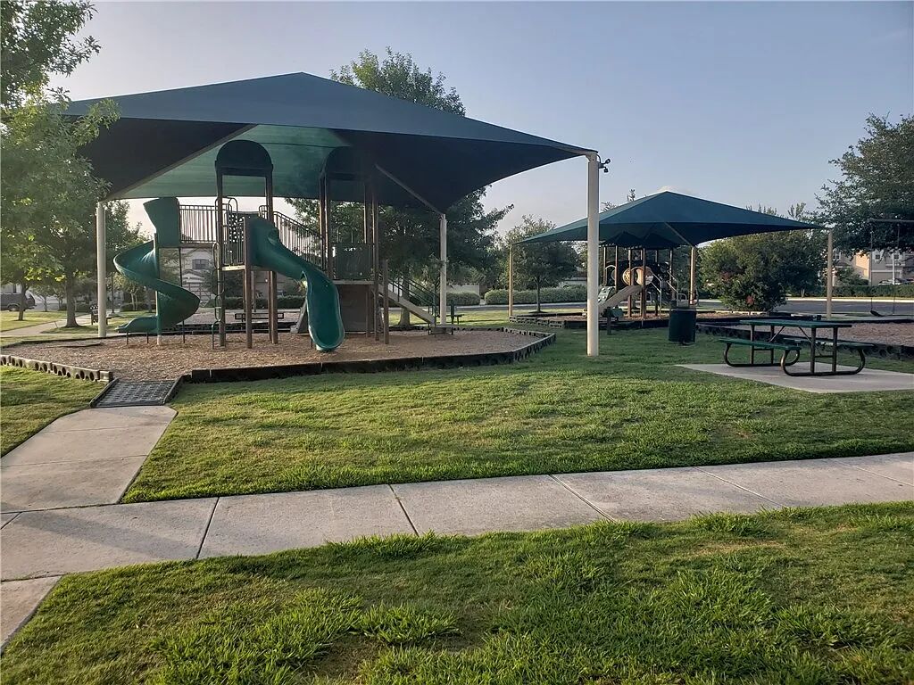 8825 Stambourne Street Austin, TX 78747 - Photo 34 of 37 a view of a house with a yard