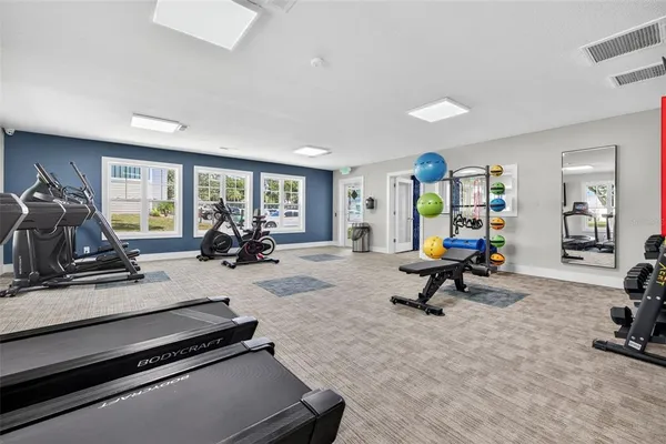 a view of a room with gym equipment