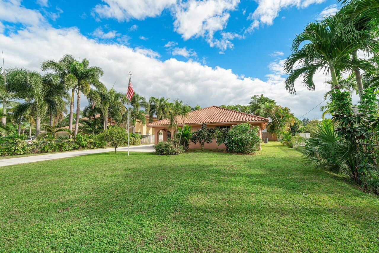 5592 1st Road Lake Worth, FL 33467 - Photo 3 of 22 003-55921stRoad-LakeWorth-FL-33467-SMALL