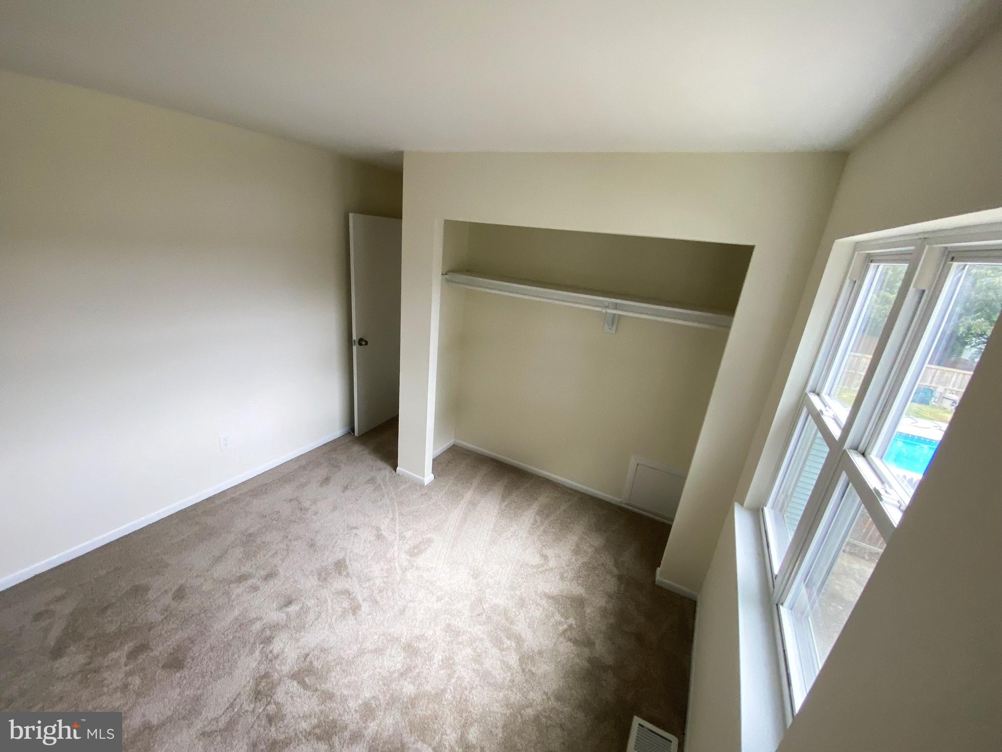 7707 Queens Road Pasadena, MD 21122 - Photo 19 of 19 Bright and airy room with potential.