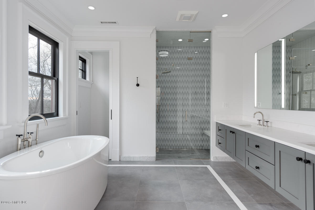 649 River Road Cos Cob, CT 06807 - Photo 22 of 27 a bathroom with a bathtub and a sink