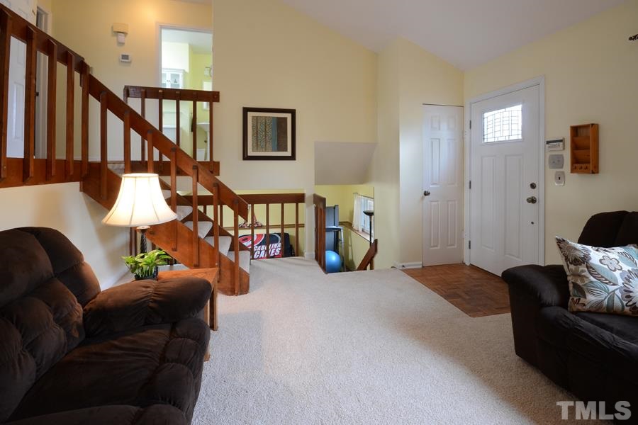2401 Boothbay Court Raleigh, NC 27613 - Photo 19 of 21 Looking toward Family room, showing coat closet and front entrance