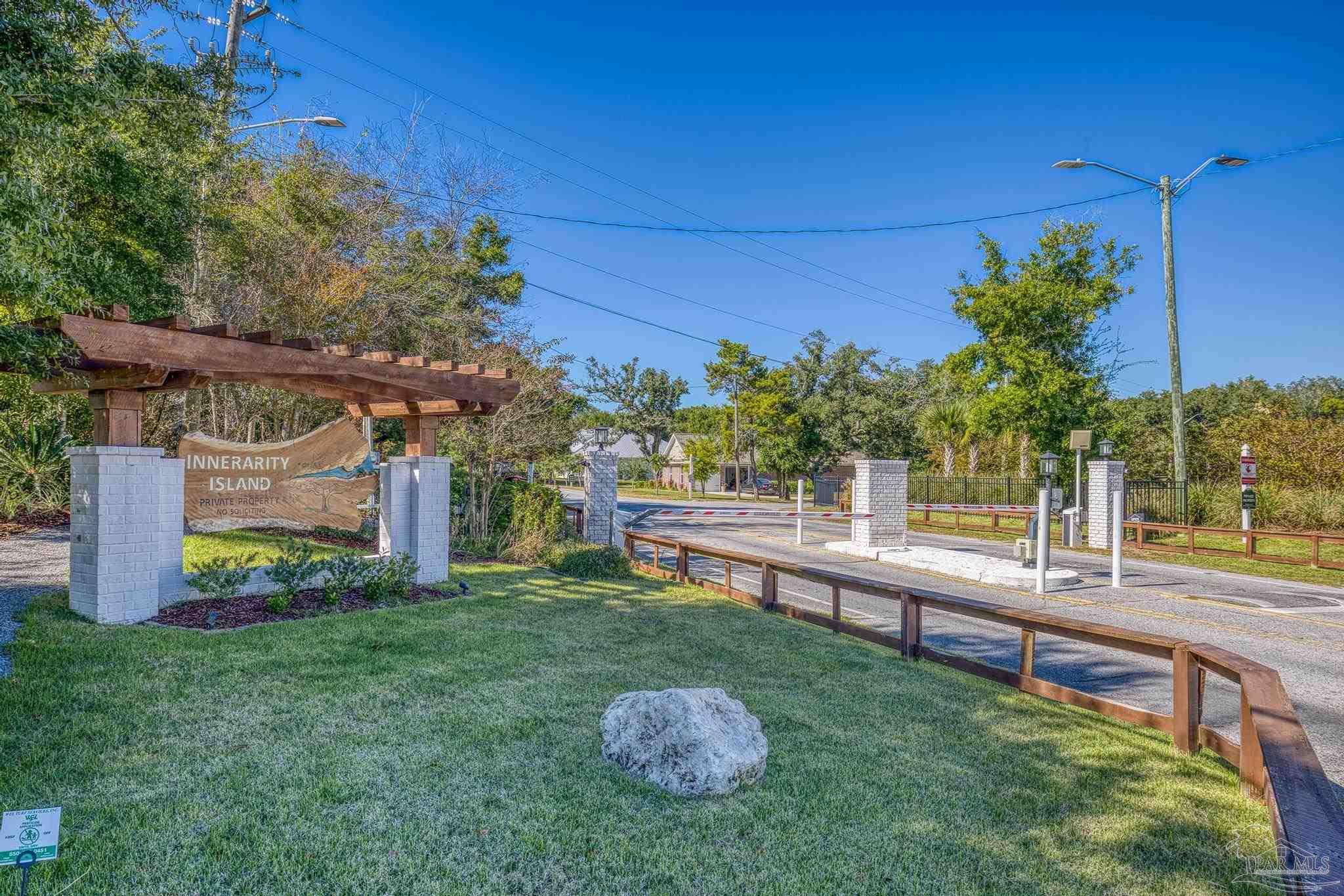 5426 North Shore Road Pensacola, FL 32507 - Photo 10 of 53 a view of a house with backyard and sitting area