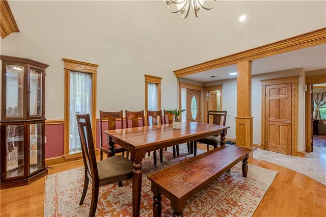 a kitchen with stainless steel appliances granite countertop a stove a sink dishwasher and a refrigerator