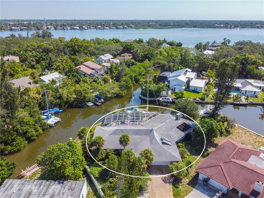 6937 Midnight Pass Road Sarasota, FL 34242 - Photo 25 of 30 an aerial view of a house with a ocean view