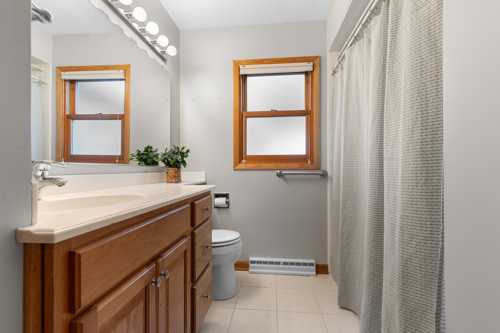 539 Riley Drive Marengo, IL 60152 - Photo 7 of 17 a bathroom with a sink a toilet and a window