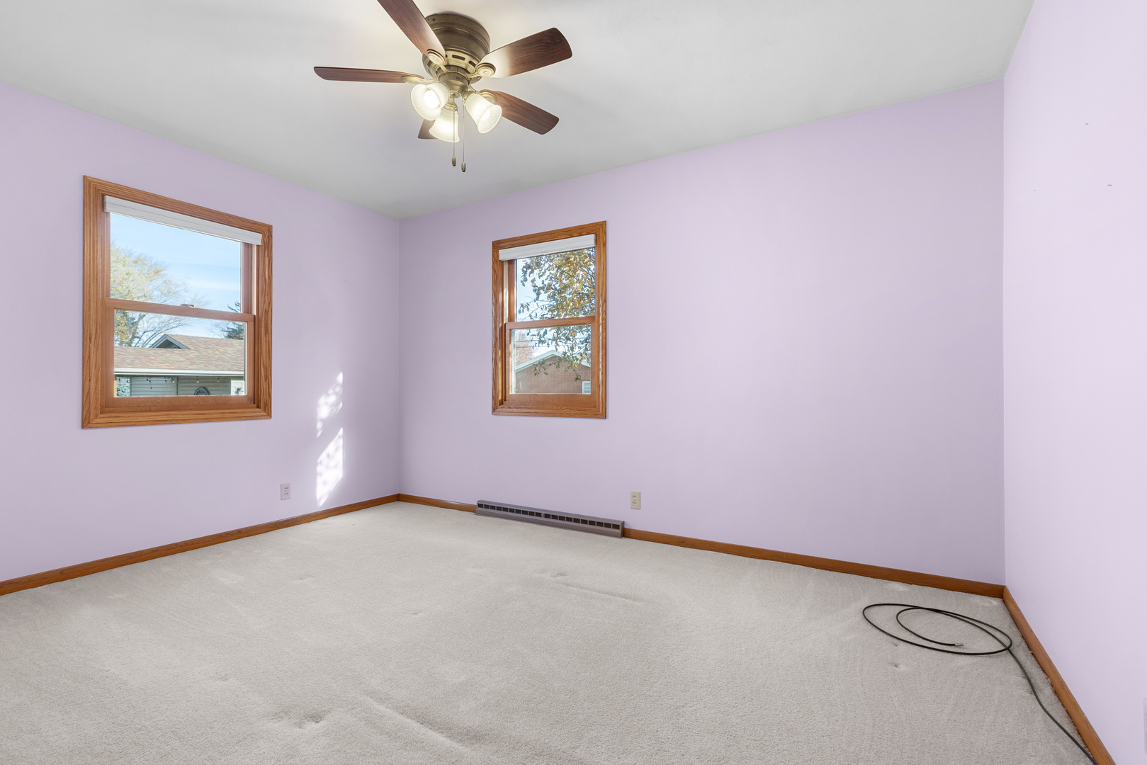 539 Riley Drive Marengo, IL 60152 - Photo 8 of 17 an empty room with windows and fan
