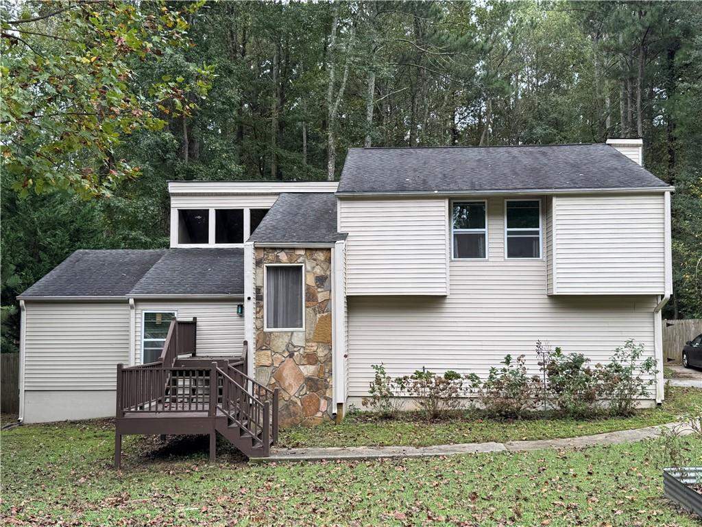 2400 Salem Drive Marietta, GA 30062 - Photo 1 of 16 a front view of a house with garden