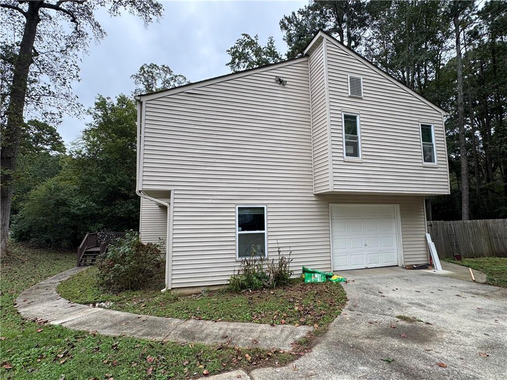 2400 Salem Drive Marietta, GA 30062 - Photo 3 of 16 a front view of a house with garden