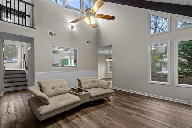 a living room with furniture and a window