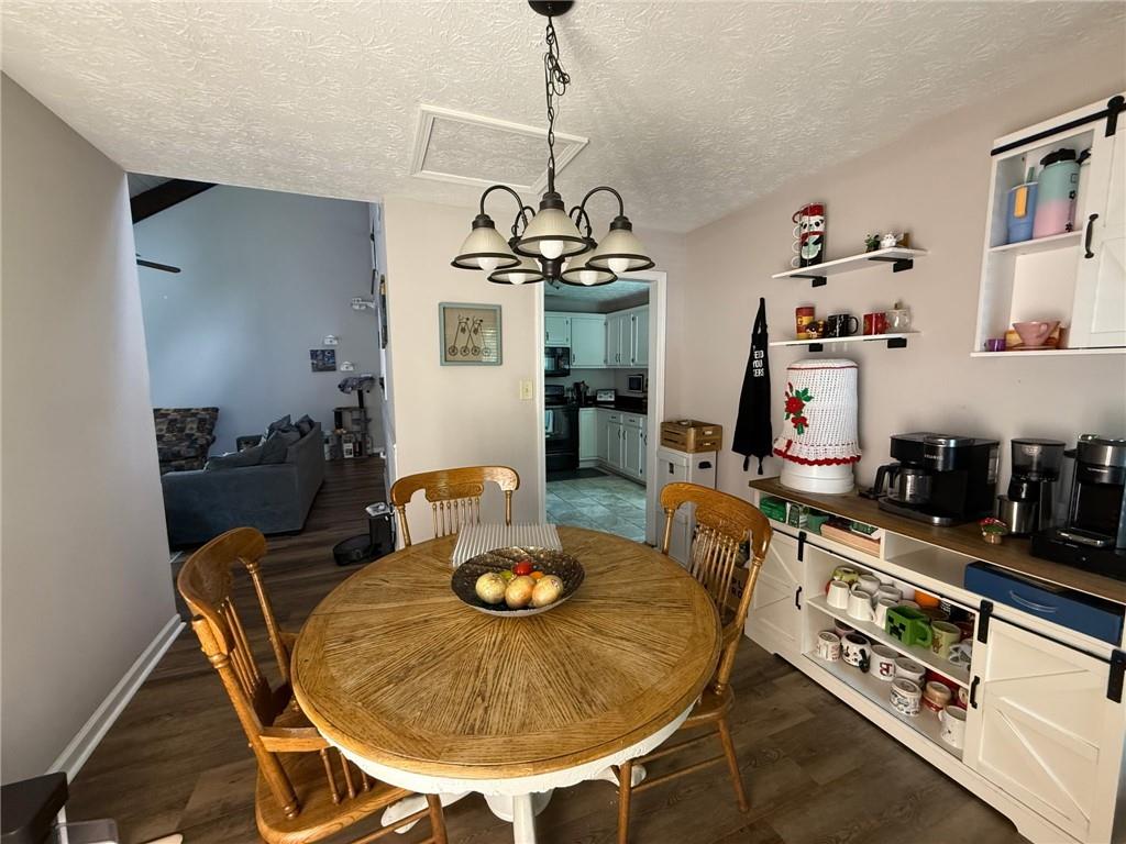 2400 Salem Drive Marietta, GA 30062 - Photo 7 of 16 a view of a dining room with furniture