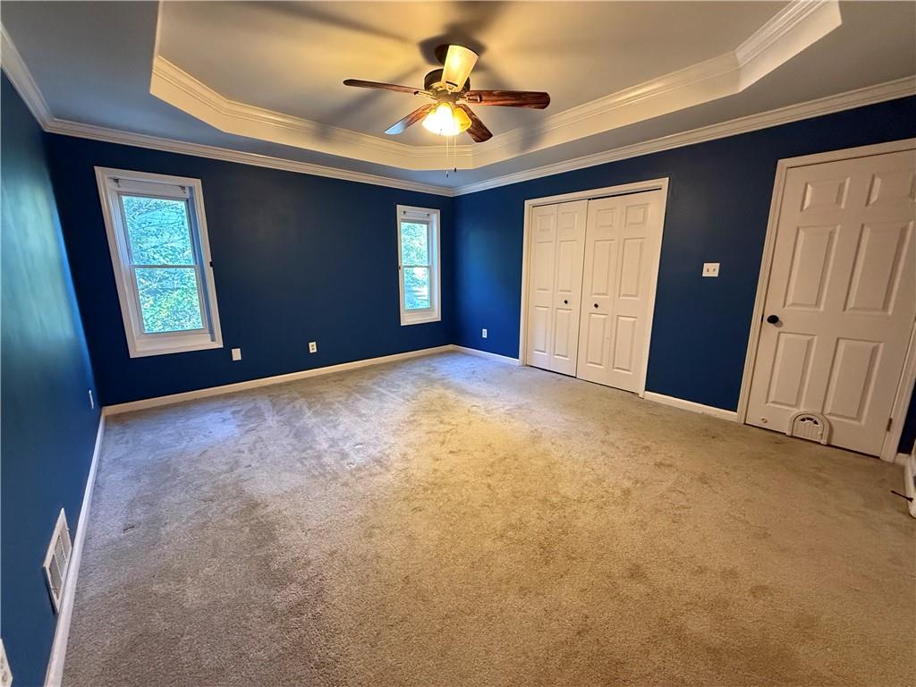 2400 Salem Drive Marietta, GA 30062 - Photo 10 of 16 a view of empty room with window and ceiling fan