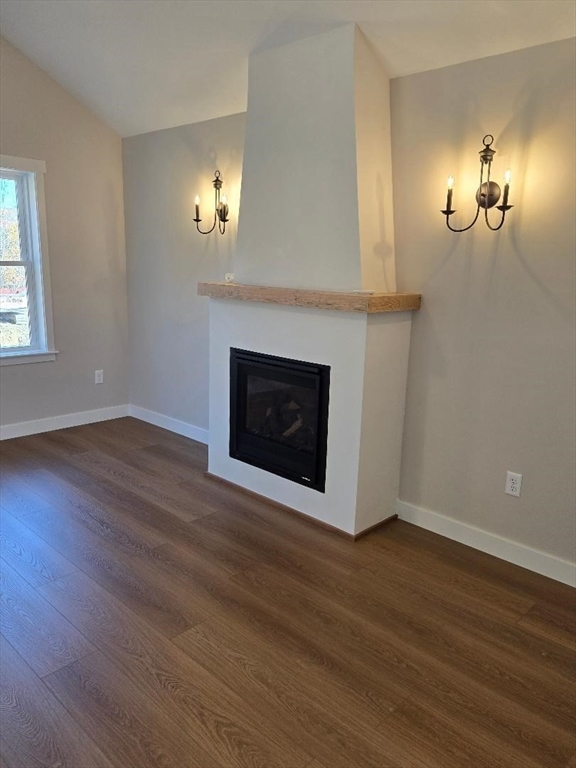 Lot 9 Willard Road Ashburnham, MA 01430 - Photo 6 of 24 a view of a livingroom with wooden floor and a fireplace
