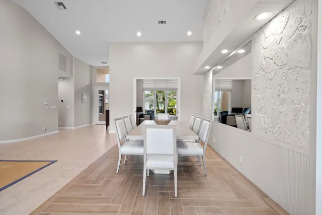 a work place with a couch and a potted plant