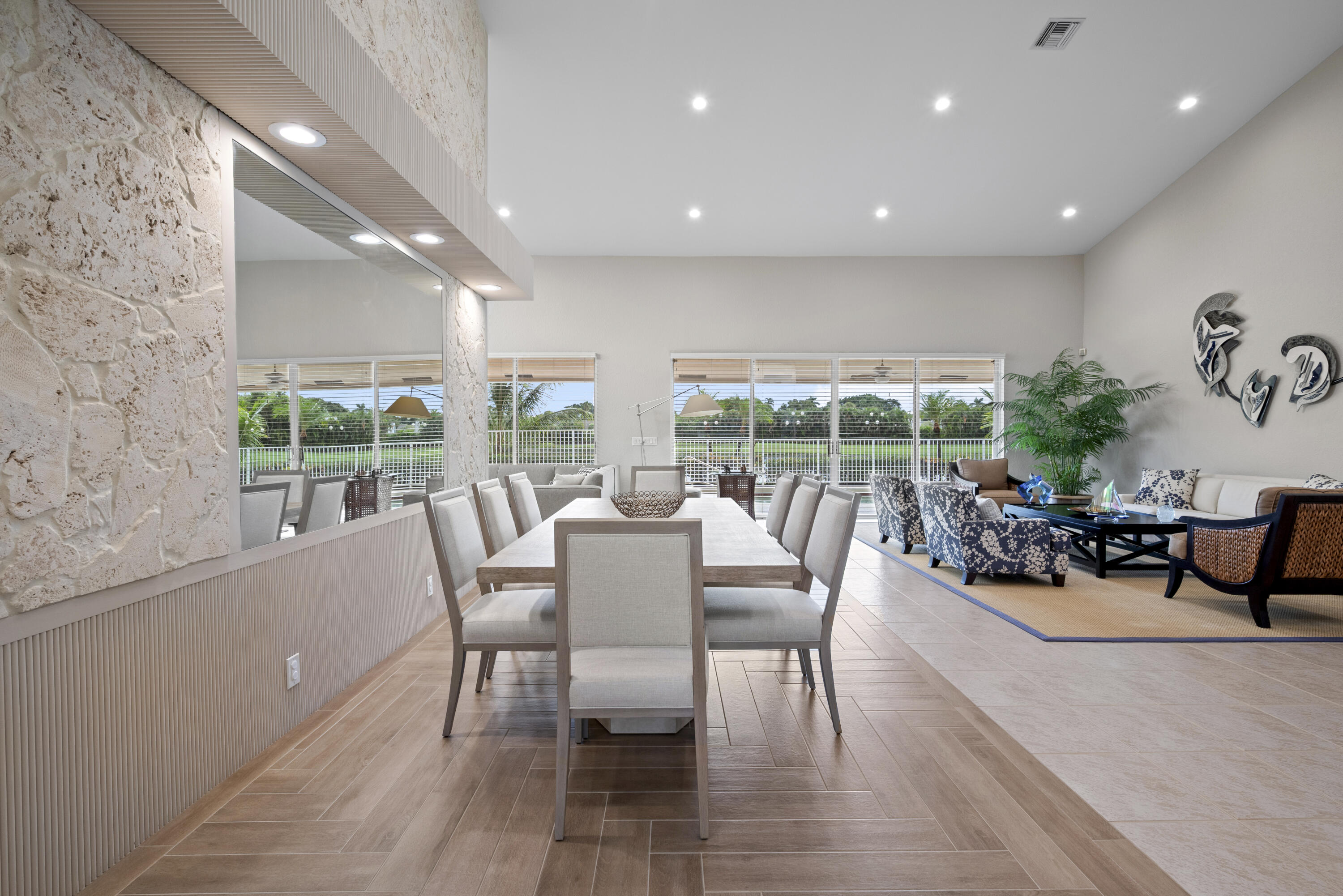 10670 Stonebridge Boulevard Boca Raton, FL 33498 - Photo 19 of 58 a view of a dining room with furniture window and outside view