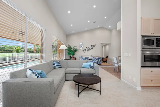 a kitchen with stainless steel appliances granite countertop a stove and a sink