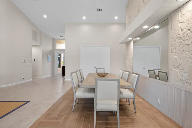 a bedroom with furniture and a book shelf