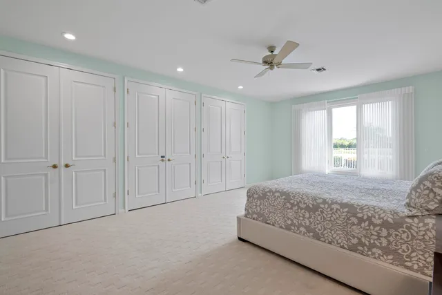 a bathroom with a toilet a sink and a mirror