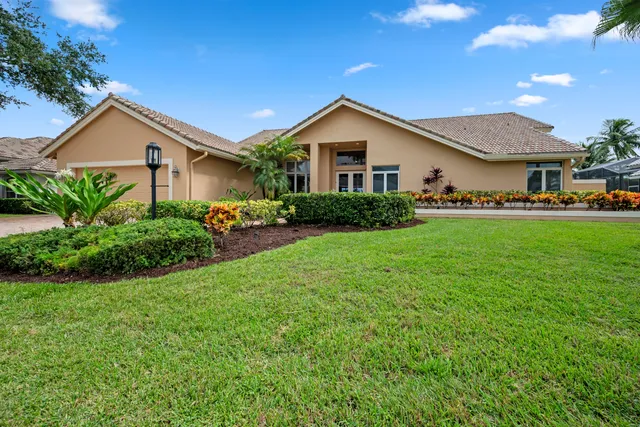 a view of a backyard with a lake view