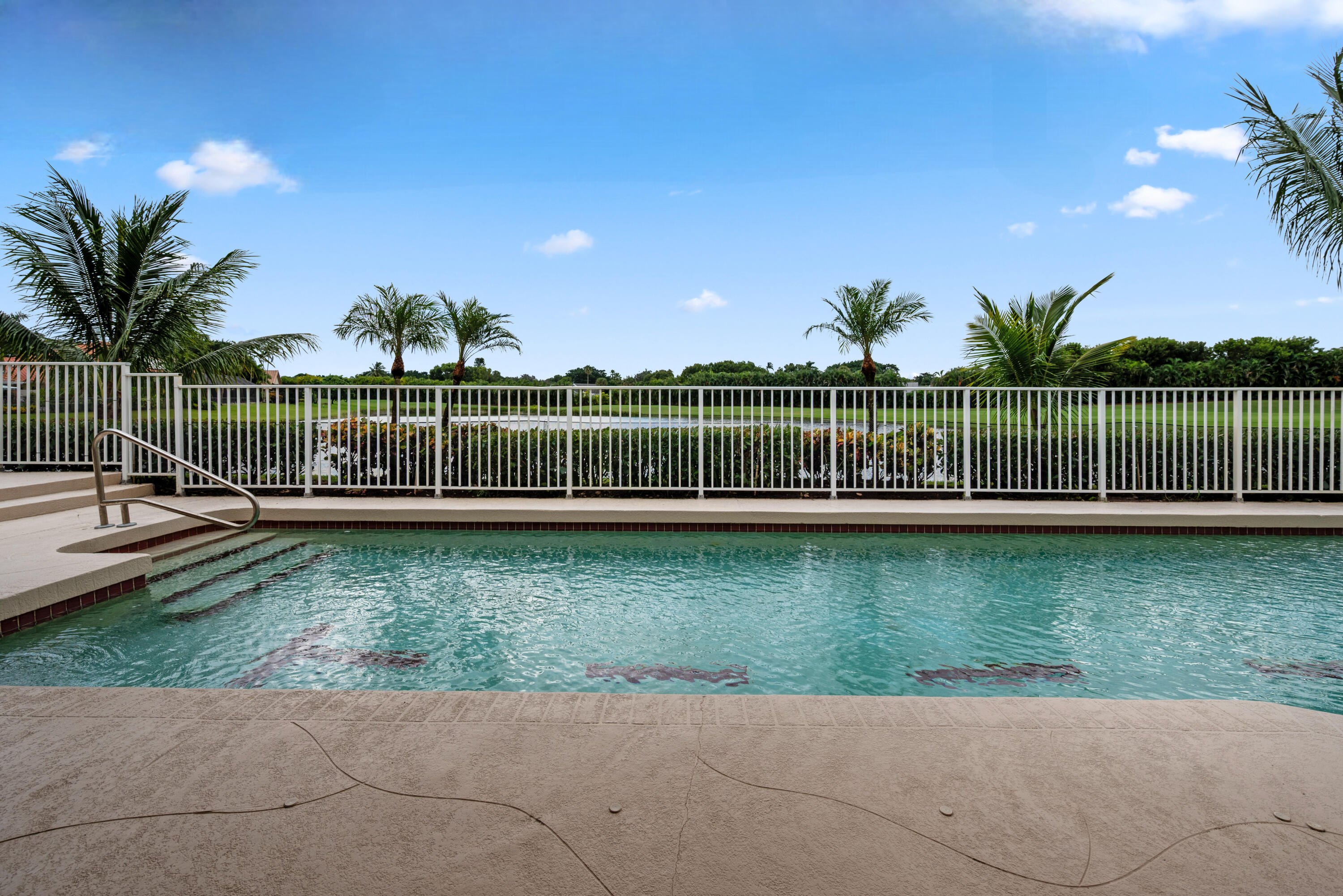10670 Stonebridge Boulevard Boca Raton, FL 33498 - Photo 45 of 58 a garden view with a lake view