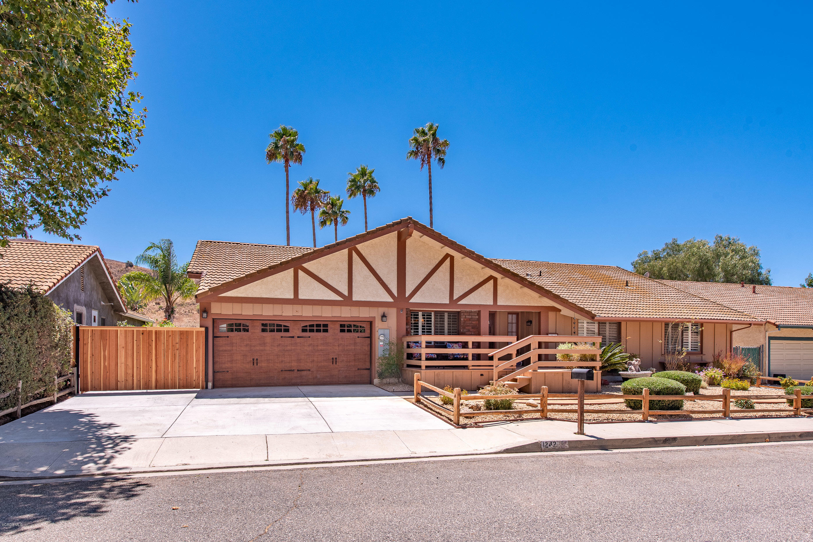 1242 Rambling Road Simi Valley, CA 93065 - Photo 1 of 81 a view of a house with a street