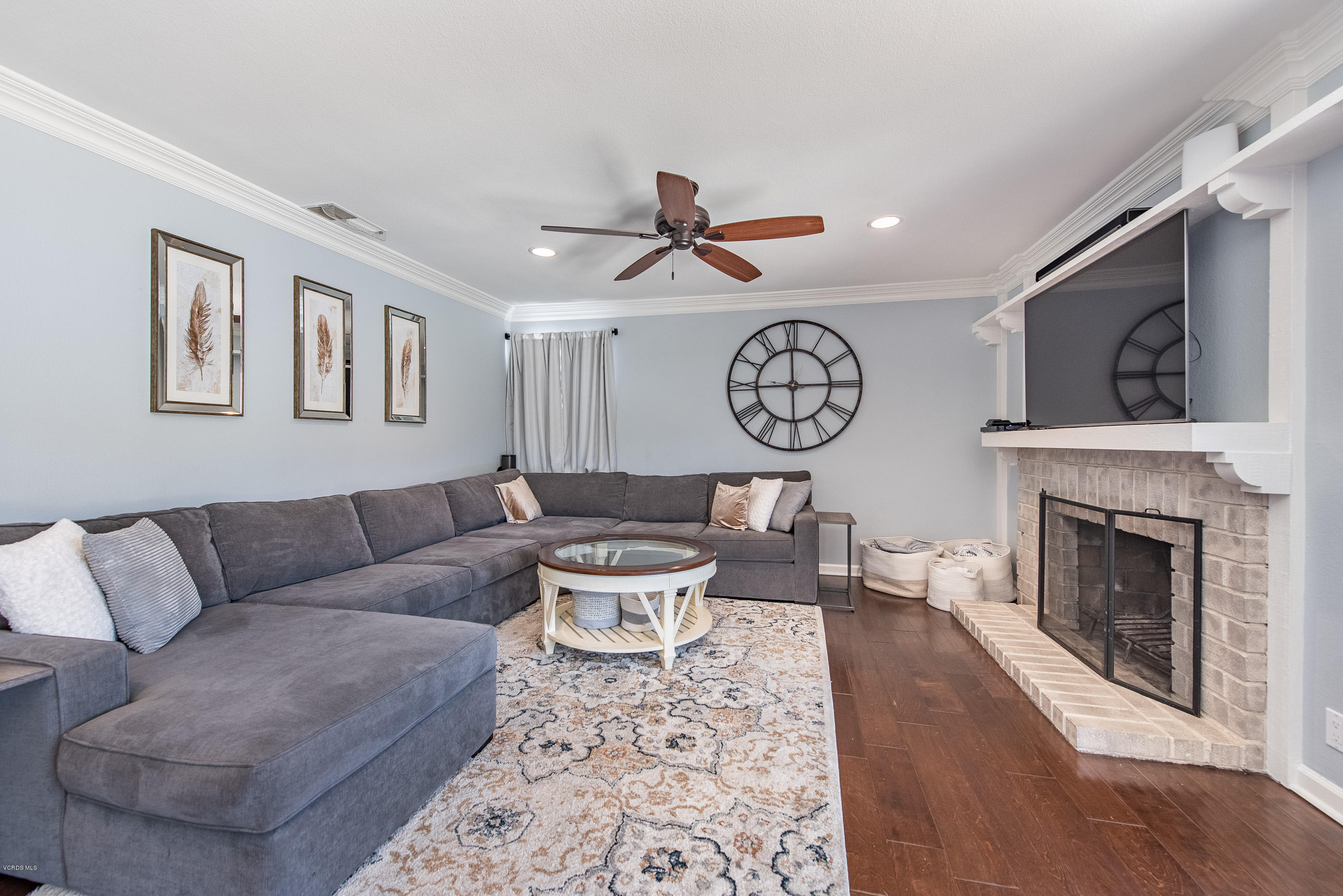 1242 Rambling Road Simi Valley, CA 93065 - Photo 20 of 81 a living room with furniture and a fireplace