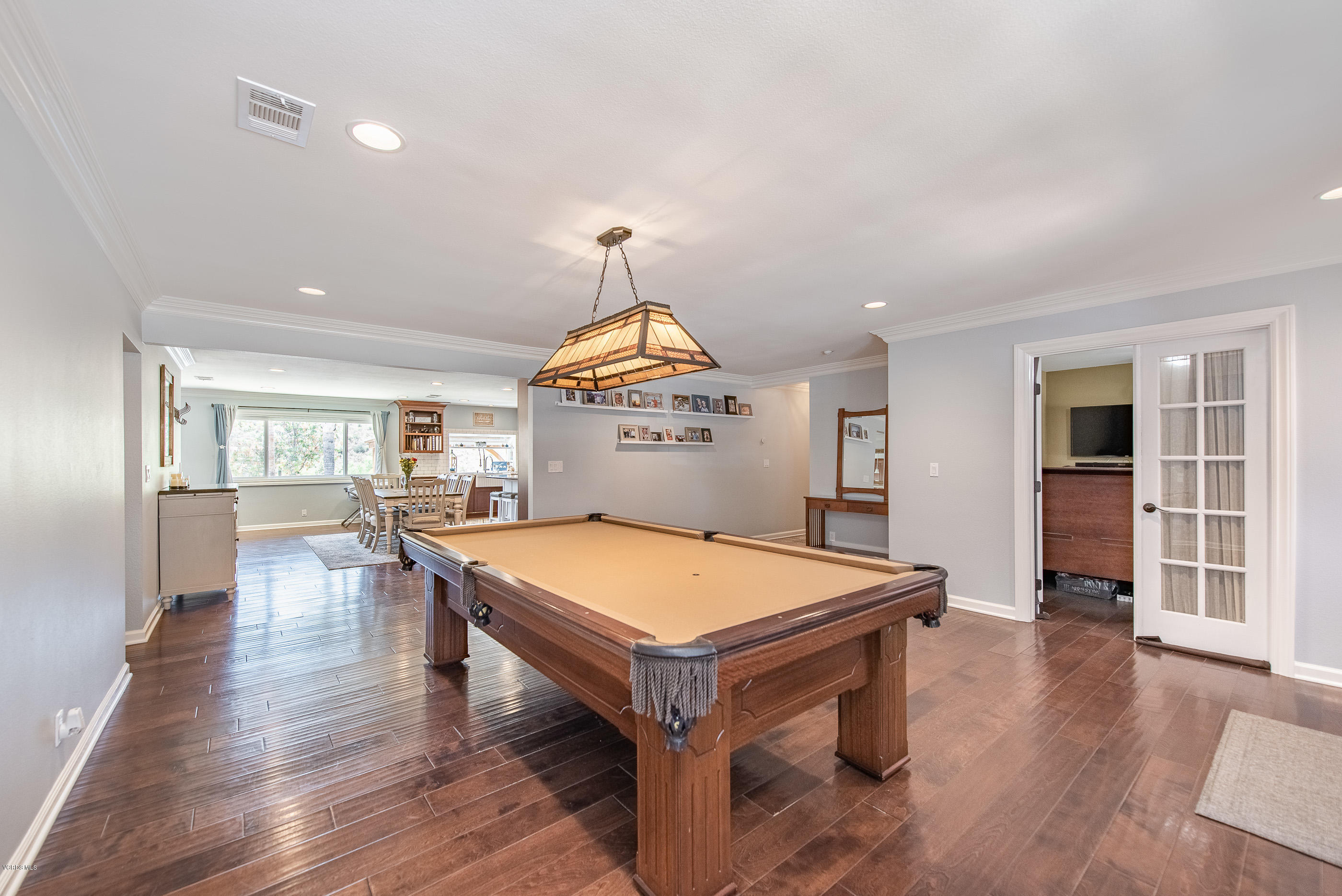 1242 Rambling Road Simi Valley, CA 93065 - Photo 25 of 81 a room with pool table and wooden floor
