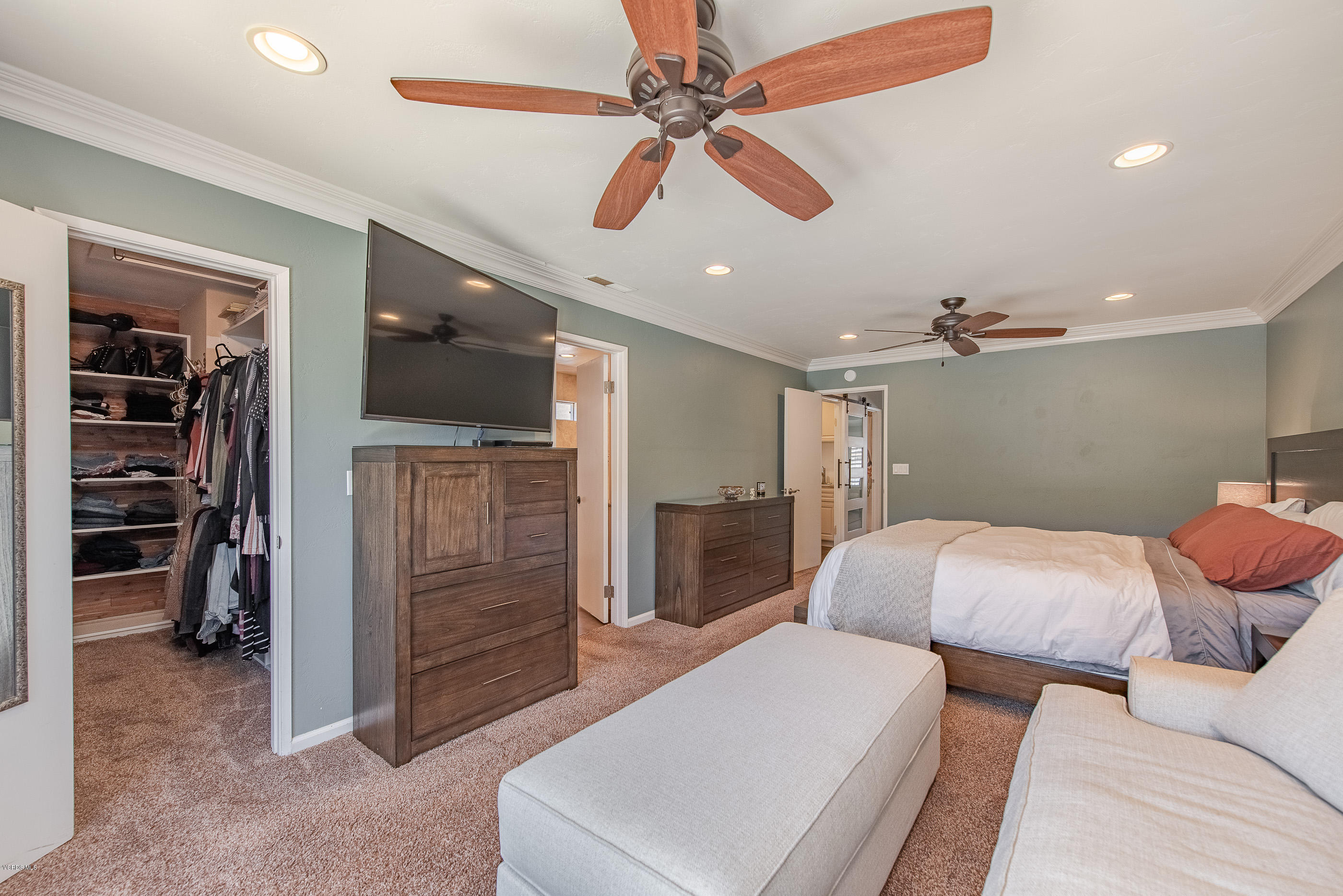 1242 Rambling Road Simi Valley, CA 93065 - Photo 30 of 81 a bedroom with a bed and a walk in closet