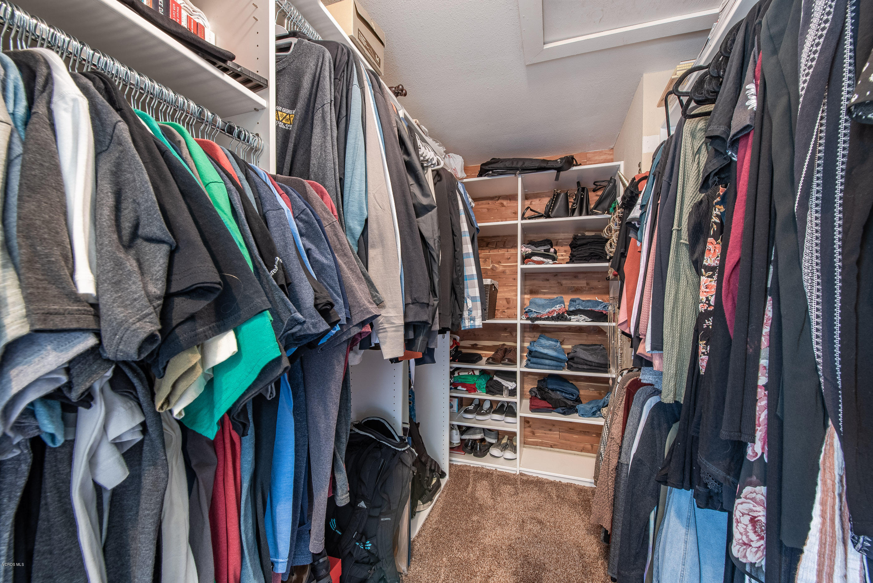 1242 Rambling Road Simi Valley, CA 93065 - Photo 31 of 81 a view of walk in closet with clothes and shoes