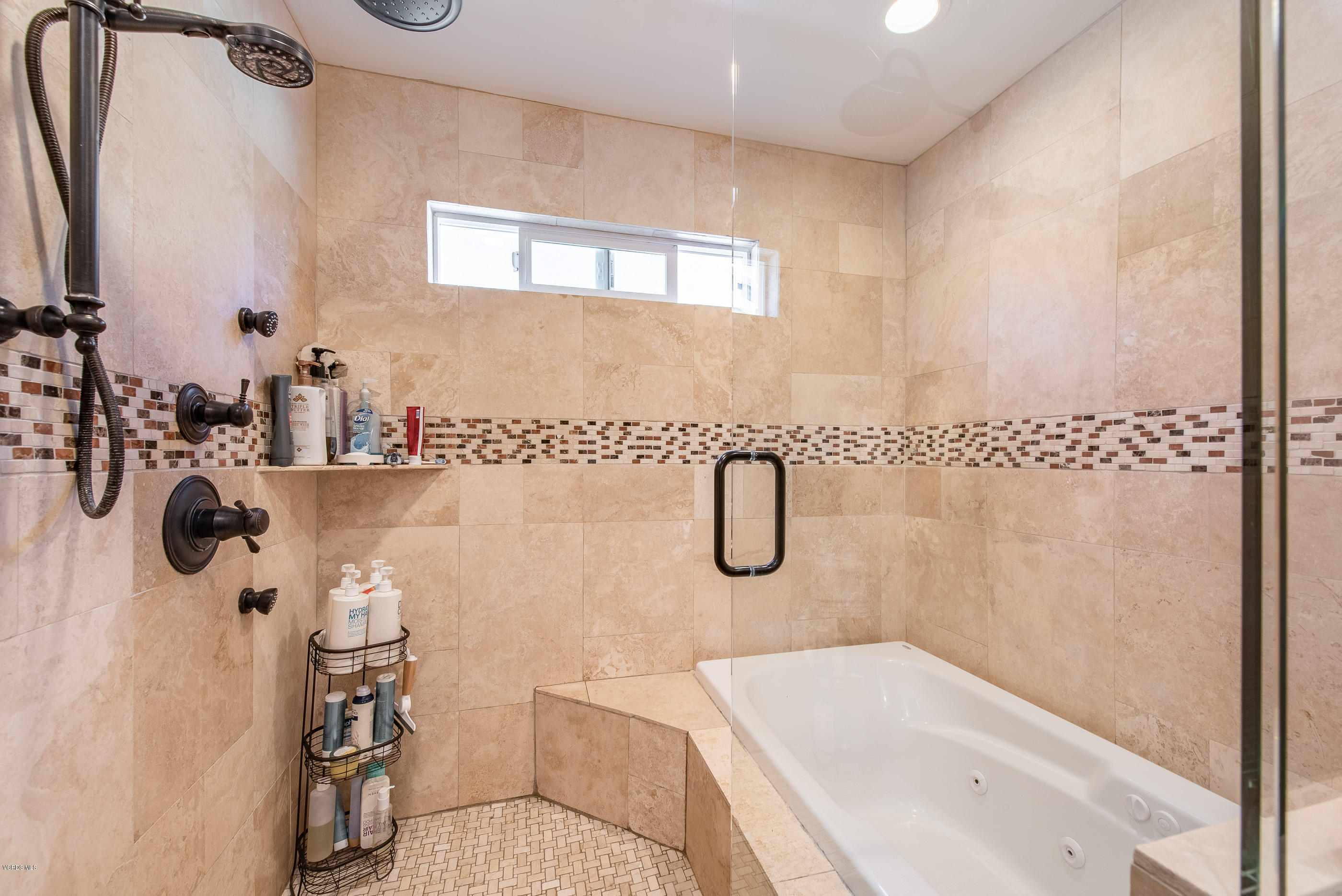 1242 Rambling Road Simi Valley, CA 93065 - Photo 33 of 81 a bathroom with a sink a toilet and shower