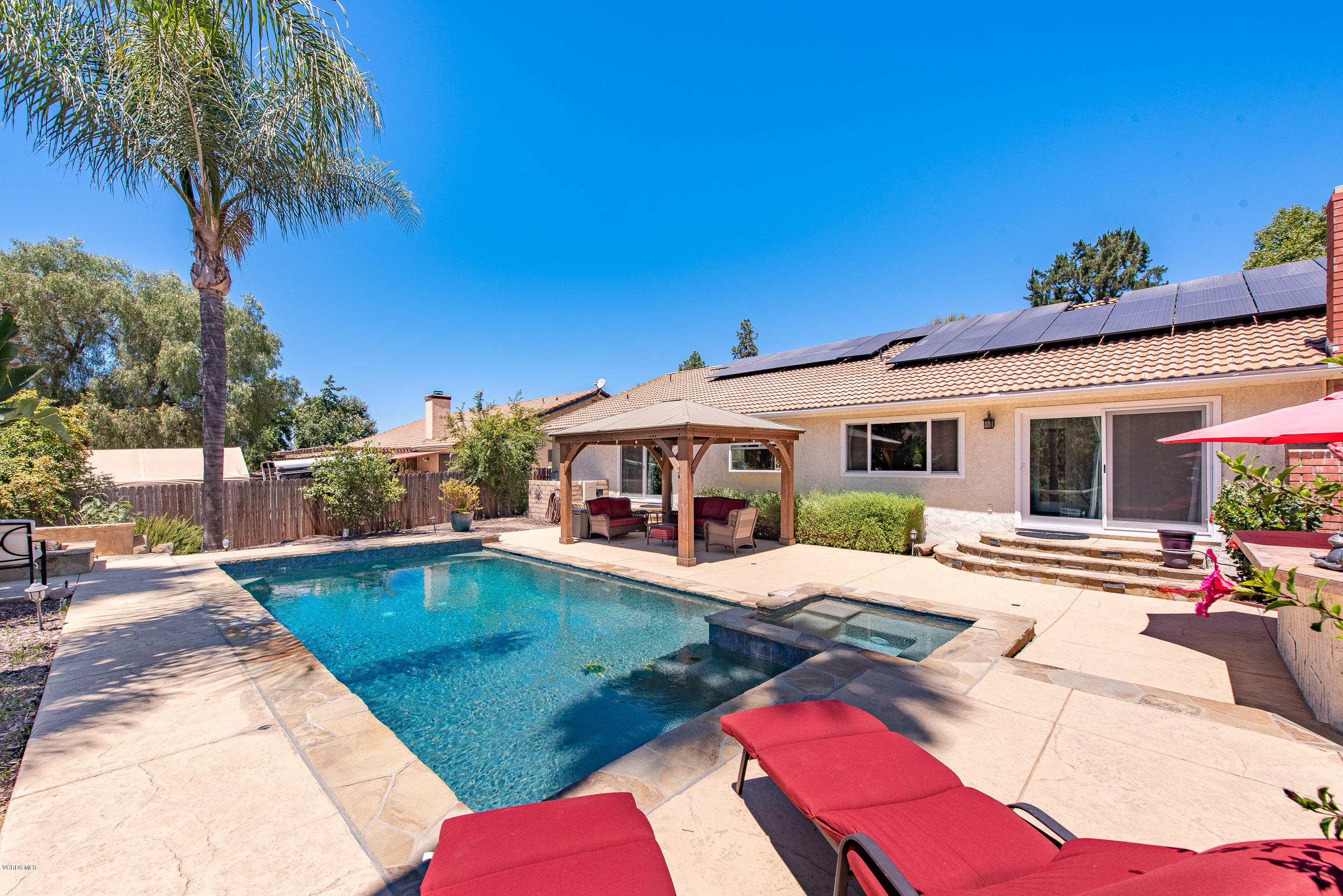 1242 Rambling Road Simi Valley, CA 93065 - Photo 43 of 81 a view of a house with swimming pool and sitting area