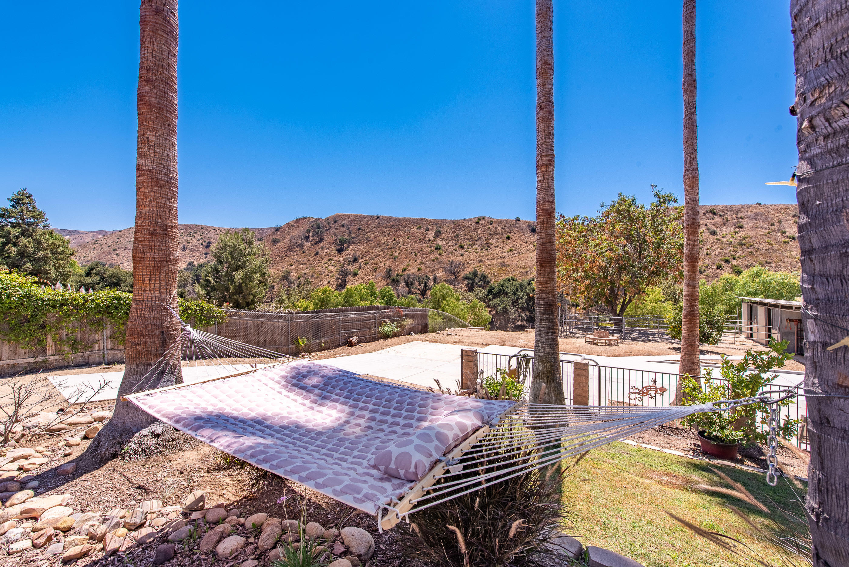 1242 Rambling Road Simi Valley, CA 93065 - Photo 49 of 81 a view of a swimming pool with a patio