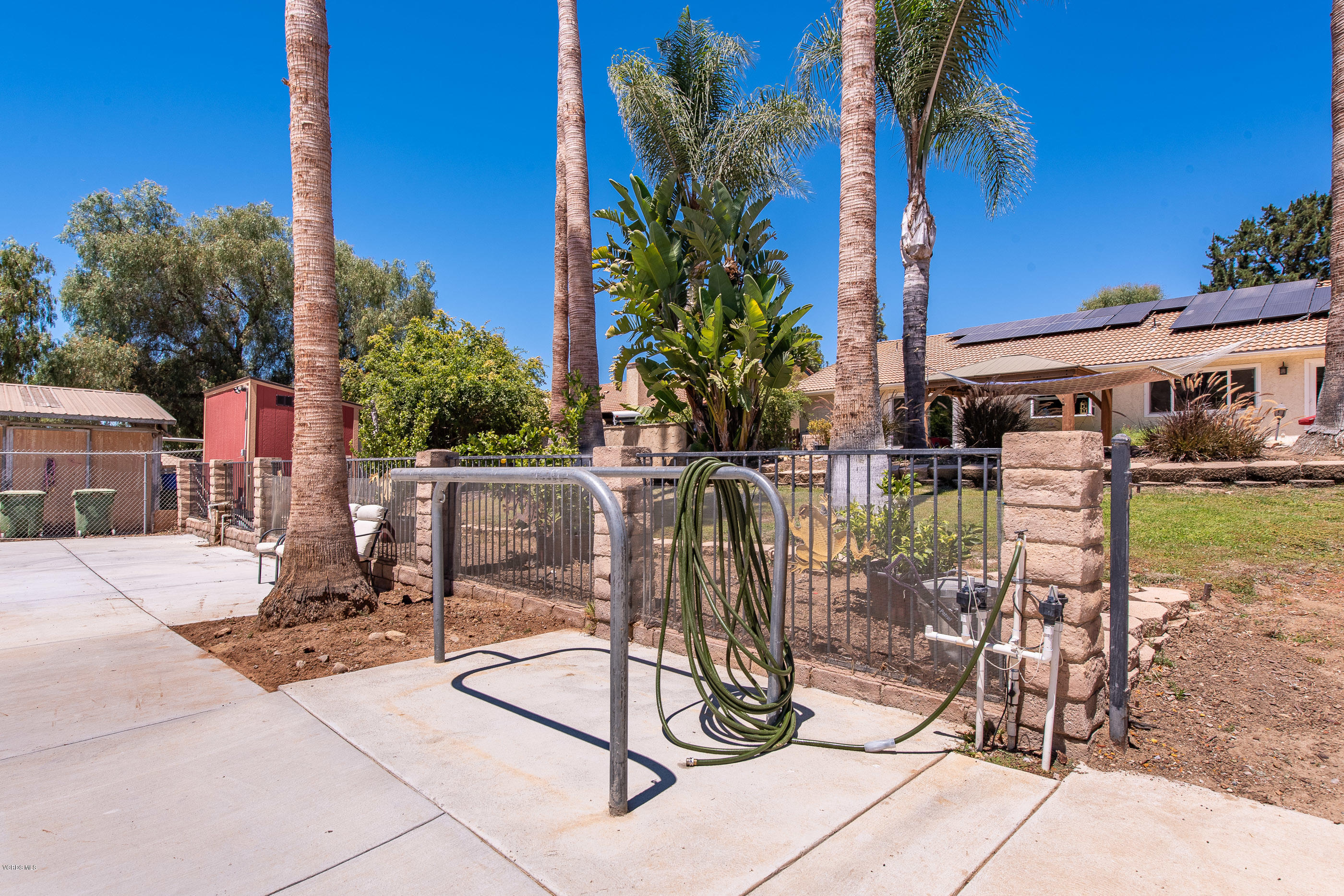 1242 Rambling Road Simi Valley, CA 93065 - Photo 51 of 81 a view of backyard of a house with outdoor seating