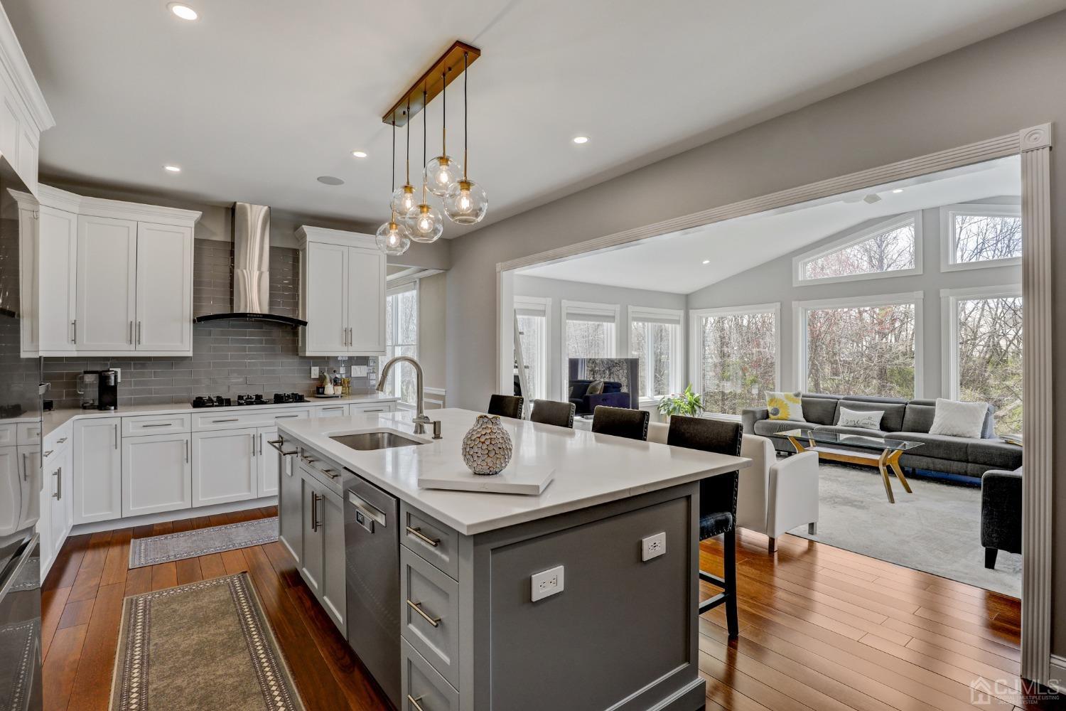 33 Edinburg Circle Old Bridge, NJ 07747 - Photo 13 of 51 a large kitchen with kitchen island a large island in it