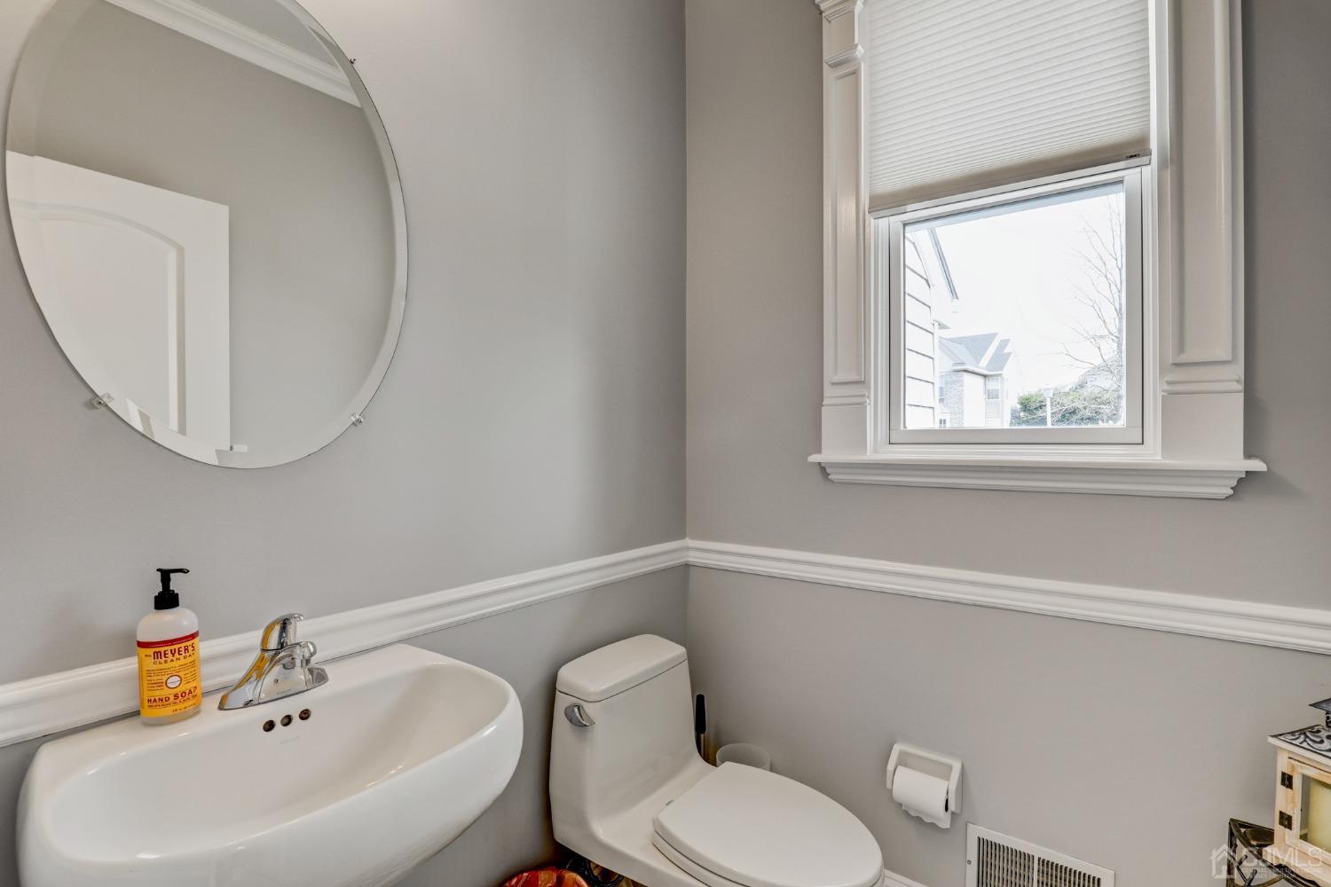 33 Edinburg Circle Old Bridge, NJ 07747 - Photo 17 of 51 a bathroom with a sink mirror and toilet