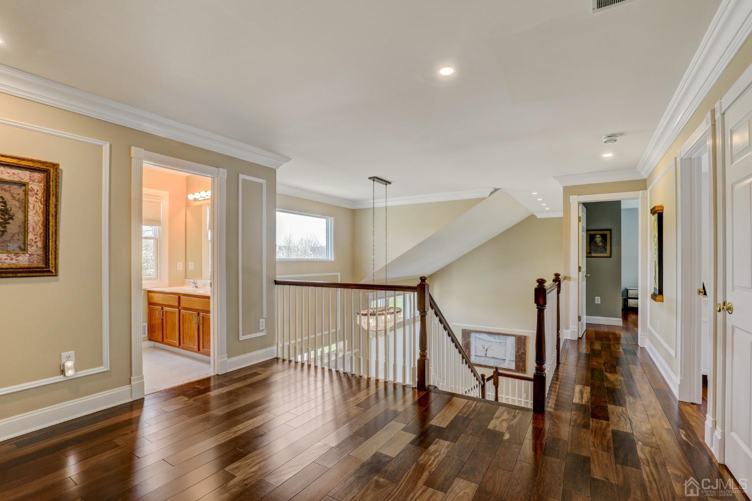 33 Edinburg Circle Old Bridge, NJ 07747 - Photo 22 of 51 a view of entryway with wooden floor and stairs