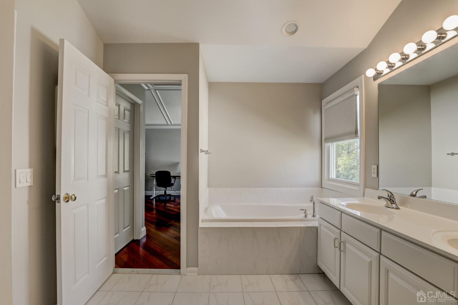 33 Edinburg Circle Old Bridge, NJ 07747 - Photo 26 of 51 a bathroom with a bathtub and a sink