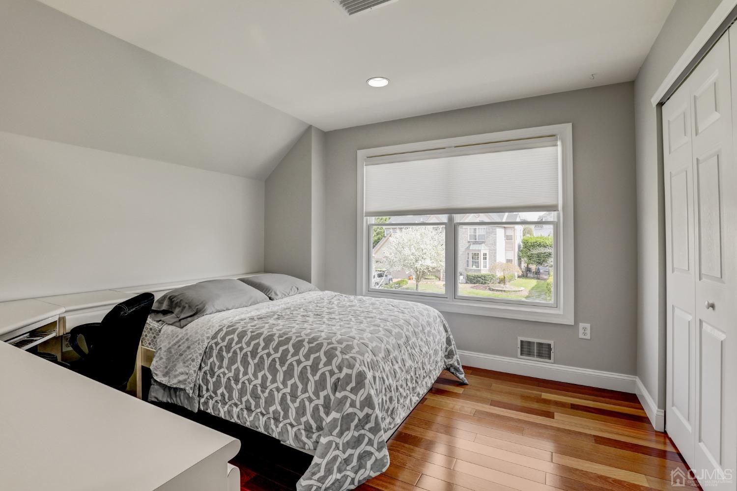 33 Edinburg Circle Old Bridge, NJ 07747 - Photo 31 of 51 a bedroom with a bed and a window
