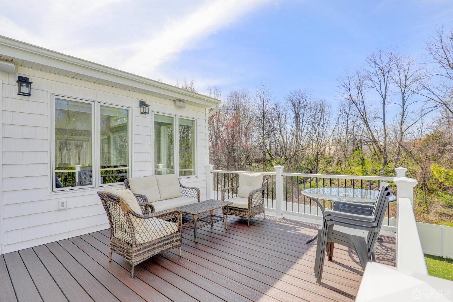 33 Edinburg Circle Old Bridge, NJ 07747 - Photo 37 of 51 a view of a chair and tables on the roof deck