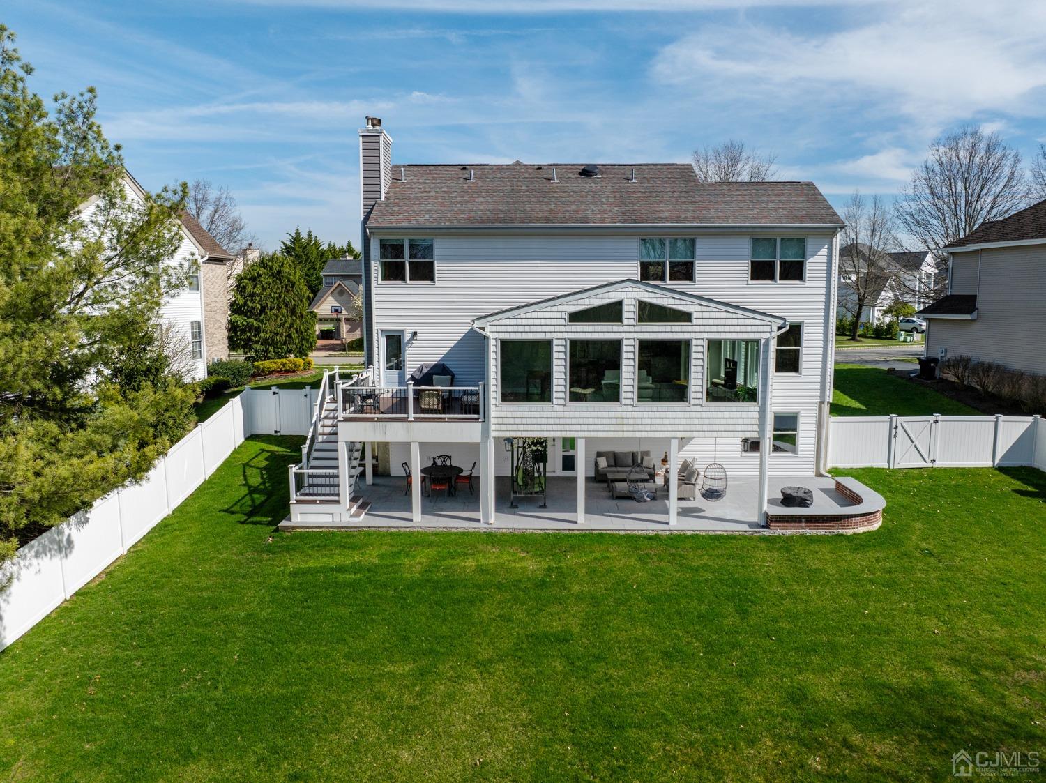 33 Edinburg Circle Old Bridge, NJ 07747 - Photo 38 of 51 a view of a house with a yard and sitting area
