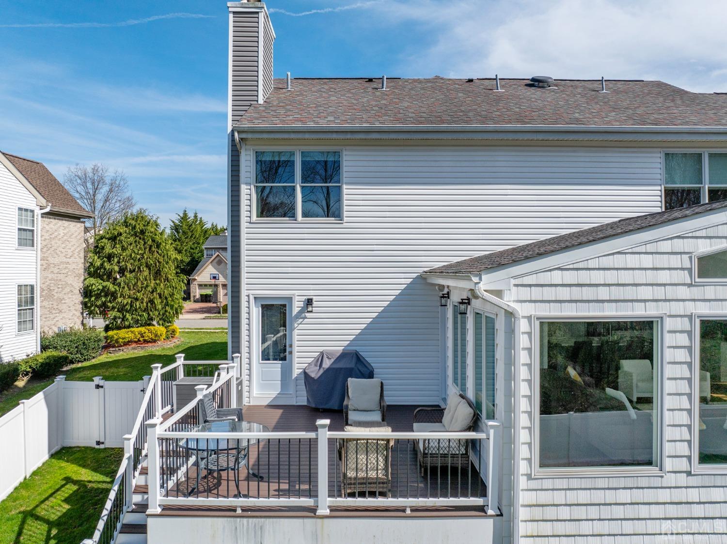 33 Edinburg Circle Old Bridge, NJ 07747 - Photo 41 of 51 a view of house with a yard and potted plants