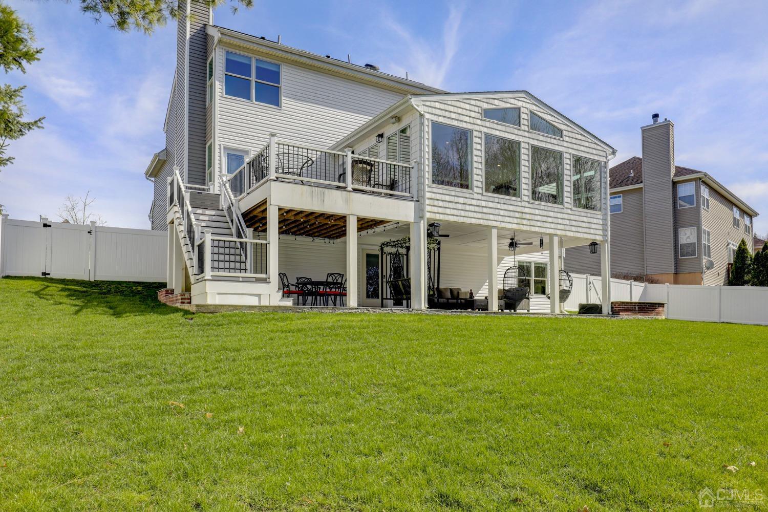 33 Edinburg Circle Old Bridge, NJ 07747 - Photo 47 of 51 a front view of a house with a garden