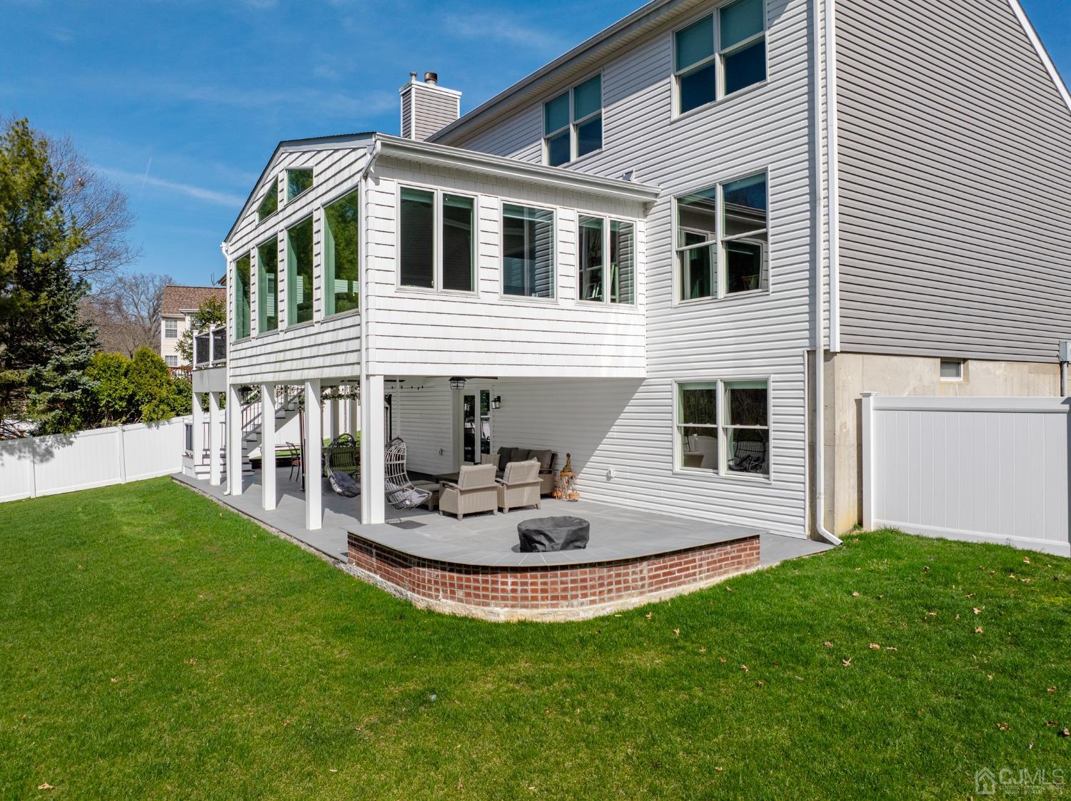 33 Edinburg Circle Old Bridge, NJ 07747 - Photo 49 of 51 a front view of a house with a yard